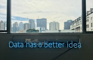 Neon lights saying, “Data has a better idea.”