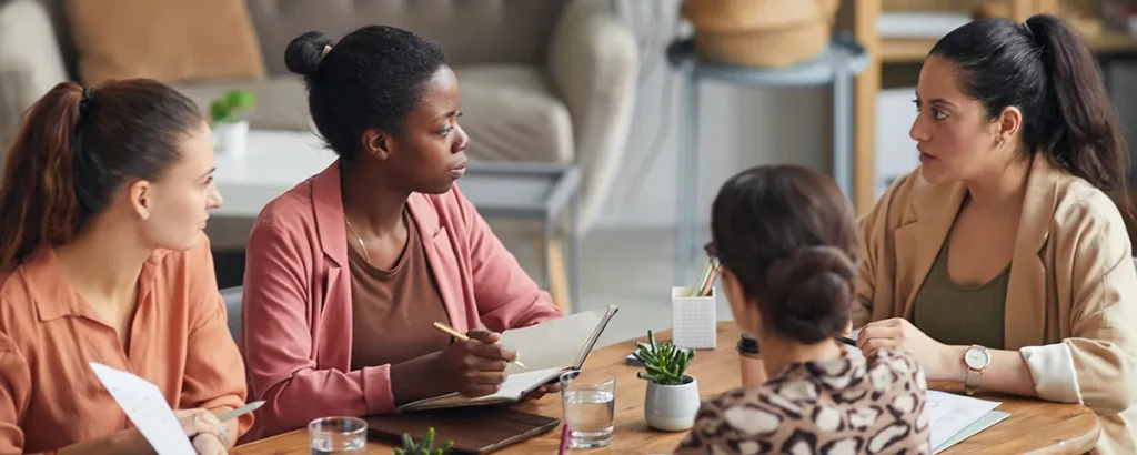 Nonprofit team meeting to plan crisis communications strategy